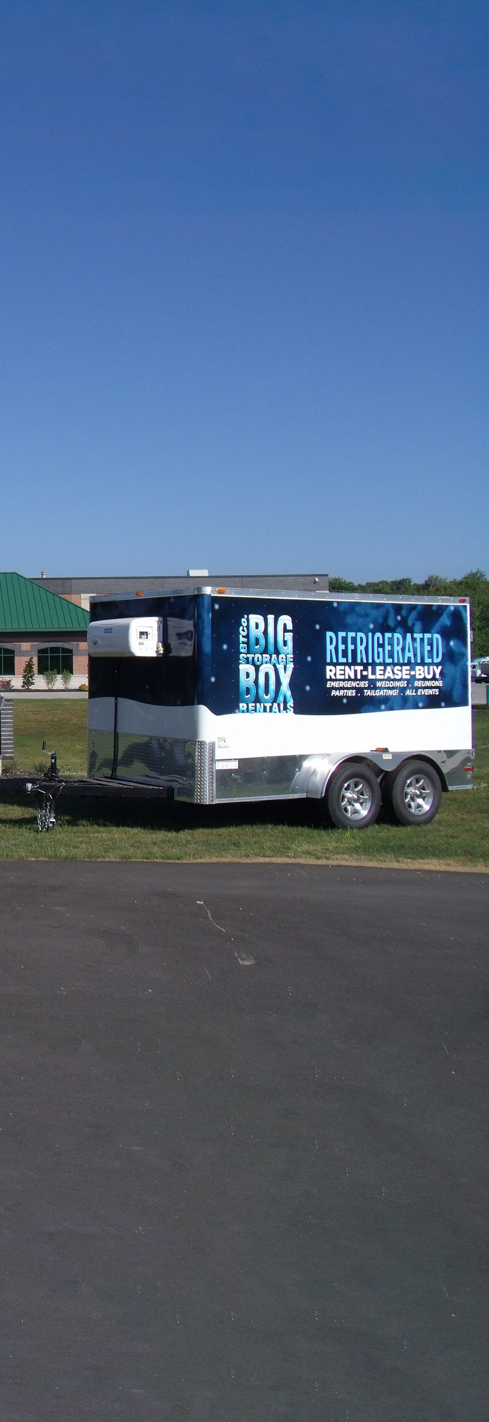 Portable refrigerated storage parked at an outdoor location.